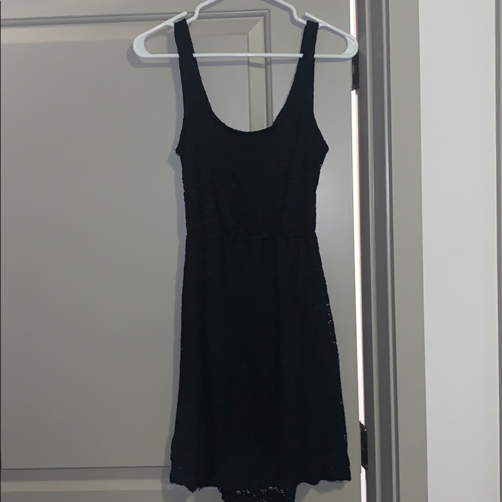 Black mini lace dress with open back detail